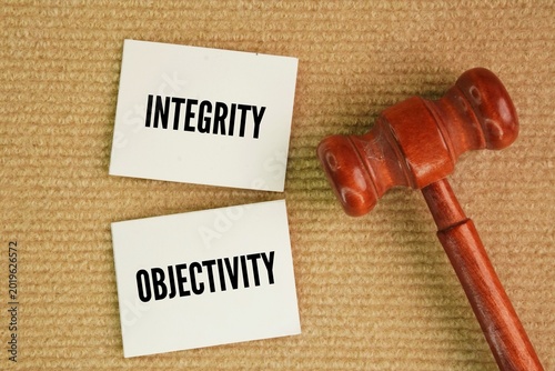 Foto Two fundamental, universally recognized principles governing professional ethics and behavior are Integrity and Objectivity word