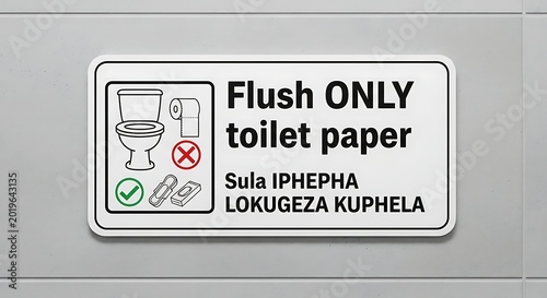 Instructional sign flush only toilet paper suggestion for public restroom use