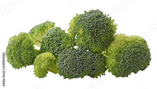 Obraz na plátně Fresh green broccoli florets piled together, isolated on transparent background