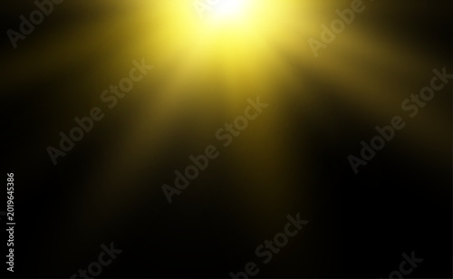 Golden sunlight rays shining from above with soft glow and realistic flare on black background. Bright warm sunbeam overlay with radiant golden illumination effect.