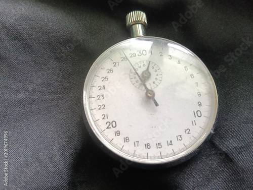 Stopwatch on a black background. Close-up of a traditional mechanical stopwatch.photo taken in malaysia