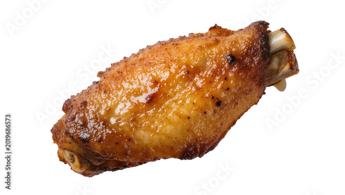 Obraz na płótnie Crispy golden brown chicken wing with visible bone, isolated on transparent back