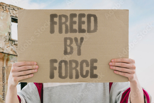 Fotografie "Freed By Force" Forced military liberation often produces new forms of subjugation