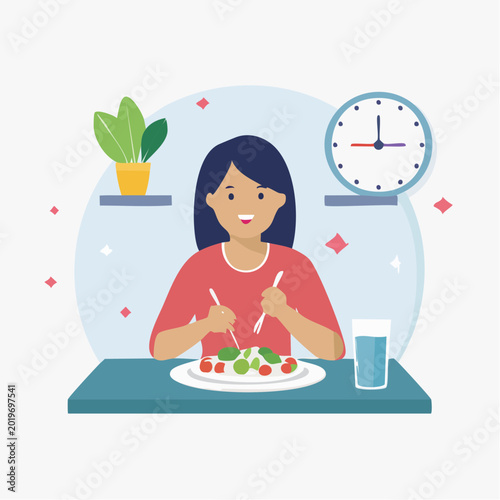 Woman Eating Healthy Salad at Table