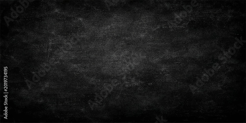 Tableau sur toile A dark grunge black and white textured background featuring an aged vintage pape