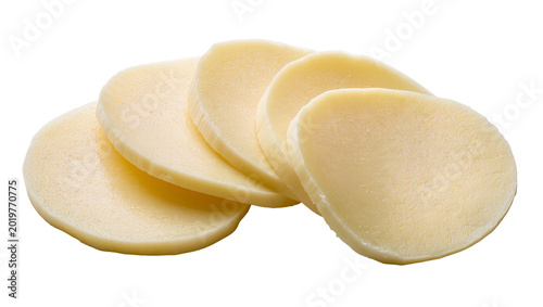 Round pale yellow cheese slices stacked and overlapping, isolated on transparent background