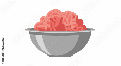 A silver bowl is filled with pink, stringy food