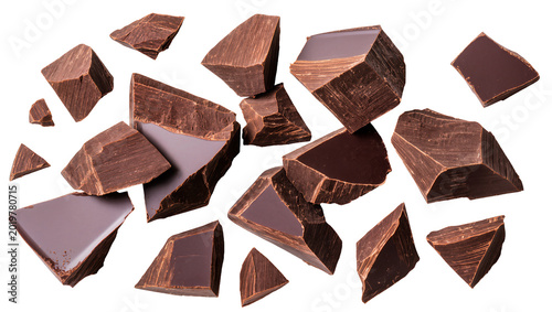 Quadro su tela Dark chocolate chunks scattered, isolated on transparent background