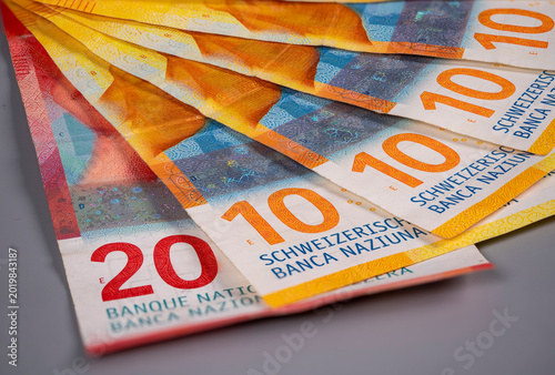 Cuadro en lienzo Swiss currency notes showing different denominations on a flat surface