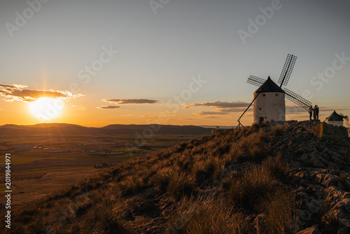Photos Consuegra windmills at sunset, iconic La Mancha landscape inspiring Don Quixote'