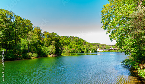 lake in forest with viaduct. Lake Eiswoog is a reservoir Palatinate Forest (Rhineland-Palatinate) near the municipality of Ramsen (Donnersbergkreis)