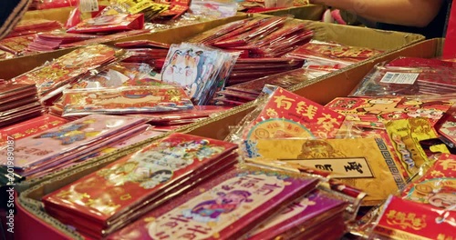 Taipei, Taiwan, February 4, 2026: Customers select colorful red envelopes on Dihua Street on the eve of the Lunar New Year.