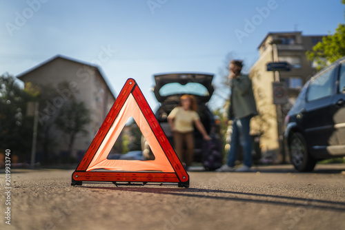 Konstfotografi Red warning triangle indicating roadside car breakdown
