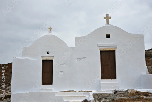Tableau sur toile Landscape with scenic view of the Treis Paides and Aghios Athanassios  two picturesque Greek Orthodox chapels in Amorgos island, Cyclades Greece
