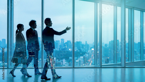 Business Team Silhouette Pointing Future Direction at Cool Morning Office Window Symbolizing Vision Leadership and Corporate Innovation Perfect for Recruitment Strategy and Branding Presentation