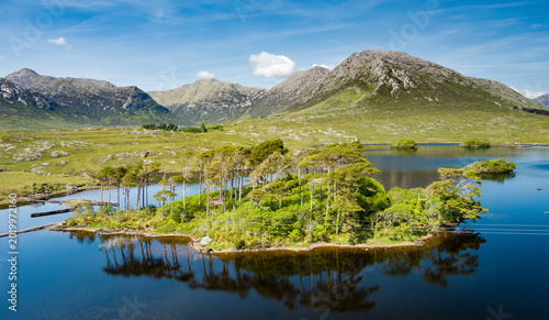 Bild auf Leinwand Aerial view of Twelve Pines Island on Derryclare Lough, Connemara, County Galway