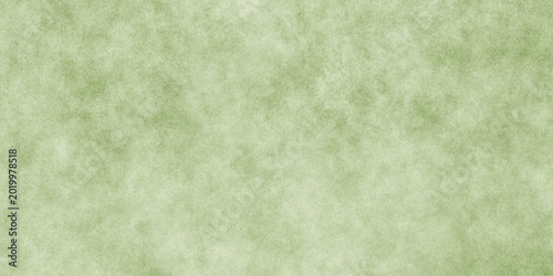Abstract Elegant dark green background with mottled vintage texture in old fancy background design, texture of colored parchment paper.	
