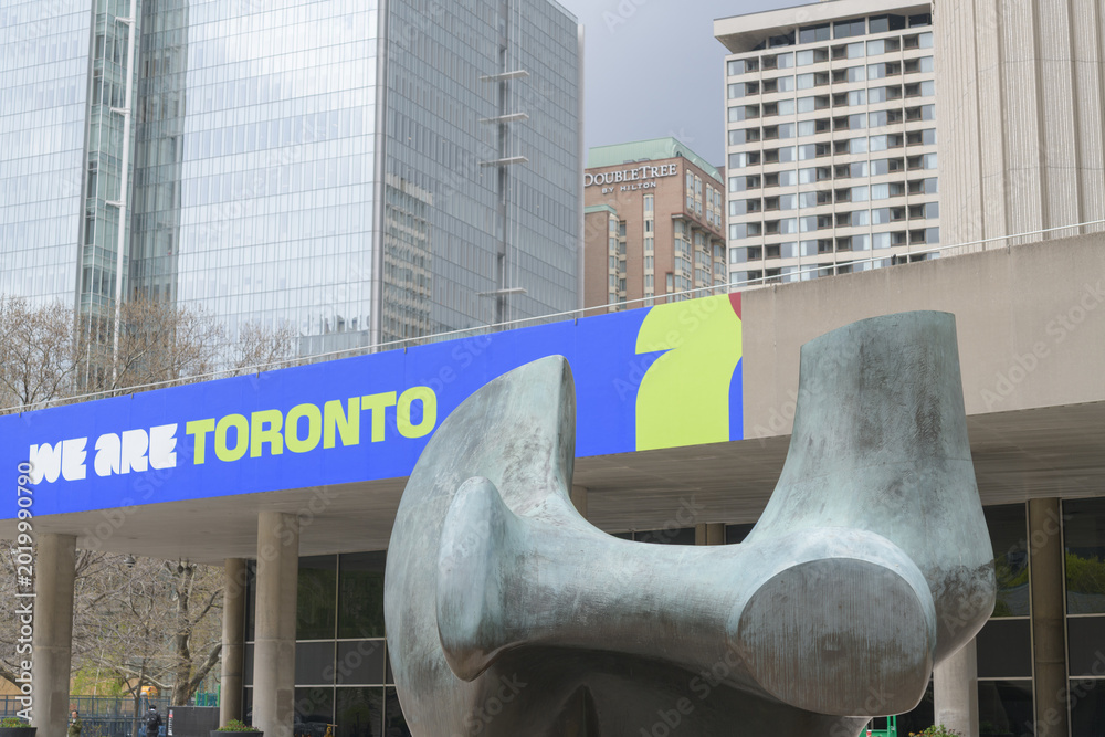 Naklejka premium Henry Moore's Three Way Piece No.2: Archer and FIFA World Cup 2026 tournament branding or host city dressing at Toronto City Hall
