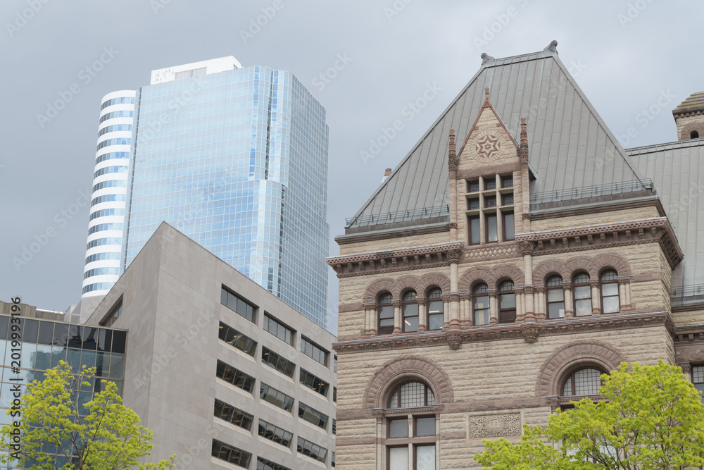 Naklejka premium exterior of CF Toronto Eaton Centre tower, (below) 483 Bay St, and Old City Hall, designed by Edward James Lennox, 60 Queen St W, Toronto