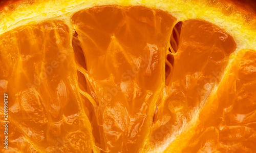 Φωτογραφία Extreme close-up of fresh juicy orange fruit pulp texture,A high-detail macro shot showing the vibrant orange texture of a sliced citrus fruit
