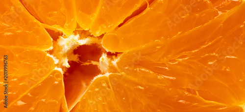 Billede på lærred Extreme close-up of fresh juicy orange fruit pulp texture,A high-detail macro shot showing the vibrant orange texture of a sliced citrus fruit