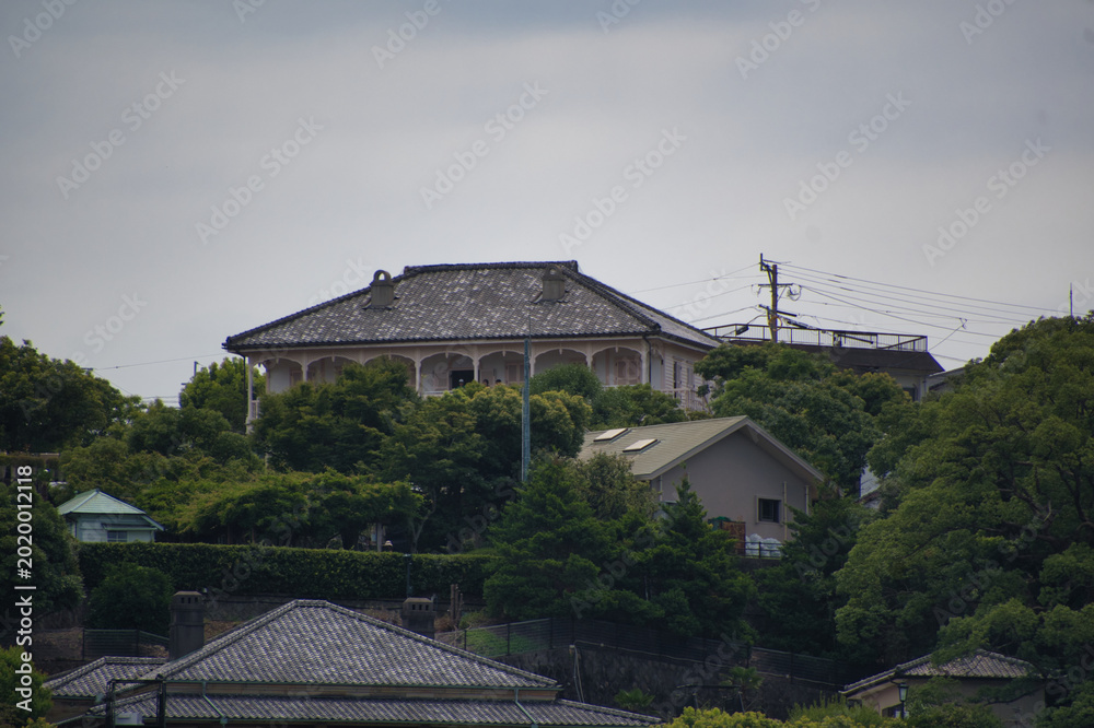 Φωτογραφία A view of Glover House from the boat.  Nagasaki, Japan