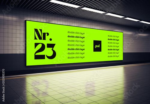 A large wall poster mockup in an underground metro station