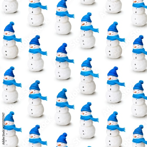 Snowmen Wearing Blue Hats and Scarves in a Repeated Pattern on a White Backgr...