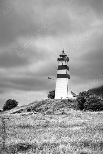 Alnes lighthouse on a blue sky	