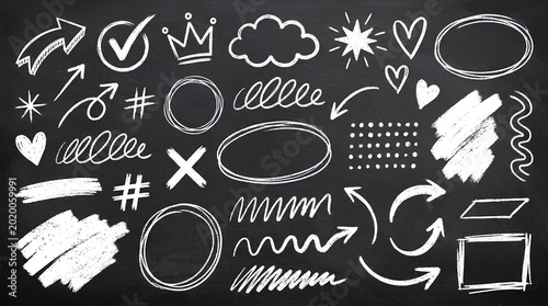 White hand-drawn doodle elements on a dark charcoal blackboard background