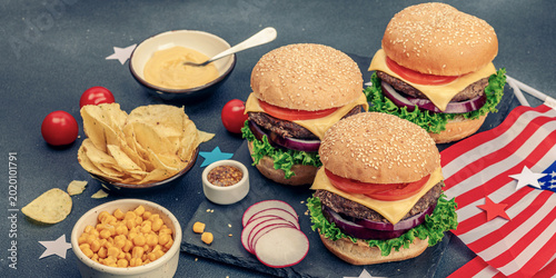 Homemade burgers. An American classic, traditional food for picnic or celebration Independence Day
