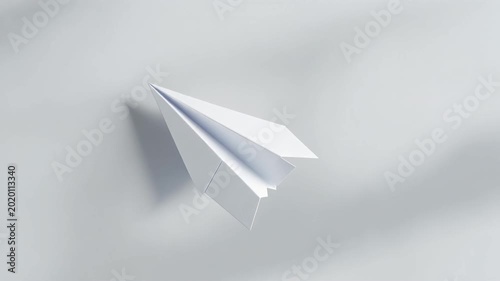 Paper Airplane Flying Over Light Gray Background