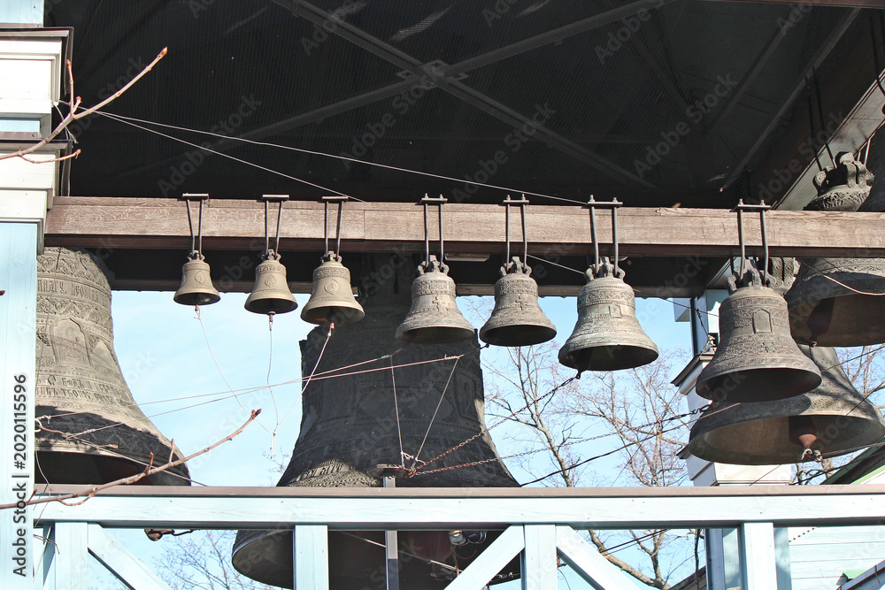 Ταπετσαρία a church belfry with bells of different sizes