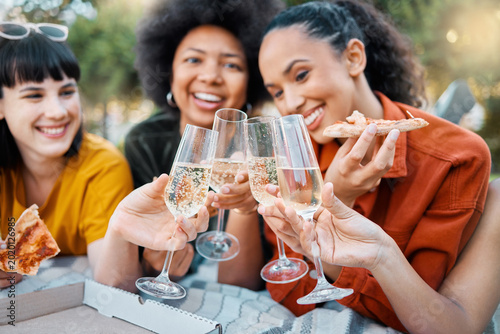 Cheers  champagne and women friends with picnic for social  gathering and celebration in park. Pizza  sparkling wine and group of people with toast  happy and bonding on holiday for outdoor hangout