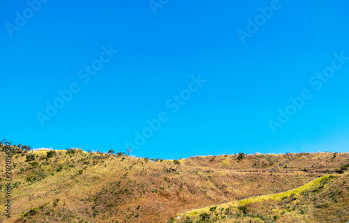 Panorama of the Serra do Curral mountain range in the city of Belo Horizonte. Blue sky. Serra do Curral. Horizontal.