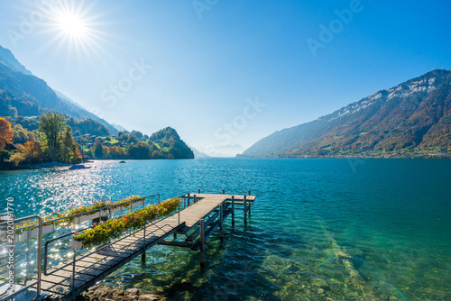 Switzerland Autumn landscape of Iseltwald pier on Lake Brienz, the filming location of Crash Landing on You. Iseltwald, Canton of Bern, Switzerland.
