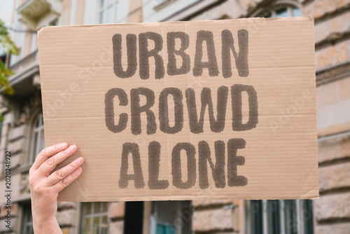 Φωτογραφία "Urban Crowd Alone" High-density urban settings correlate with deepening individual isolation