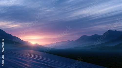Beautiful landscape of a mountain range at sunset. the sky is filled with vibrant colors of pink, orange, and blue, with the sun setting in the background.