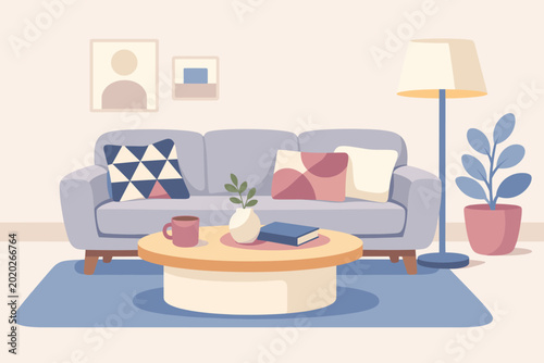 Contemporary furniture arrangement displaying a soft gray upholstered sofa