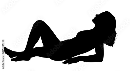 Silhouette of a Woman Relaxing on Her Back.