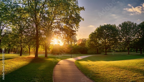 golden hour in the park a tranquil park scene bathed in the soft golden light of dawn or dusk inviting you to wander through its sun dappled pathways