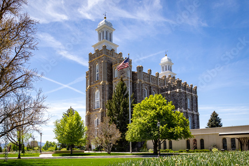 Logan Utah Temple Exterior Historic LDS Church Building with Mountains and Blue Sky