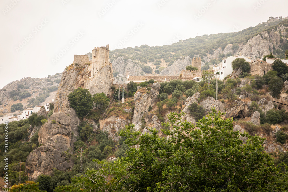 Fototapeta premium the medieval castle built on steep rocks in the village of Zuheros, province of Cordoba, Andalusia, Spain