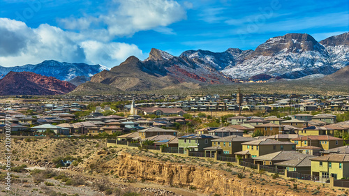 Photography Aerial Red Rock Snow Covered Mountains and Residential Neighborhood Las Vegas