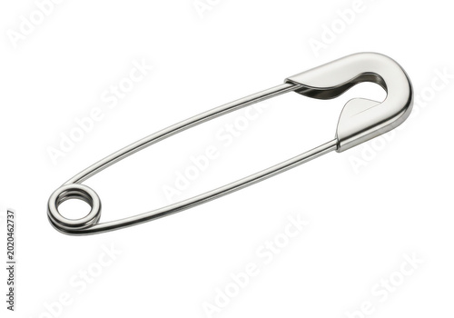 A close-up view of a silver safety pin with a unique wave design on the clasp.