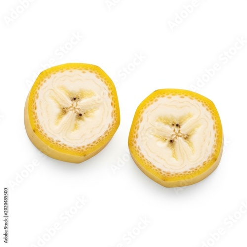 Two fresh banana slices, close-up, isolated on white background.