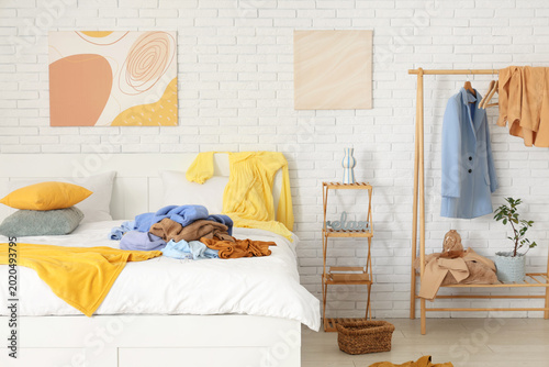 Interior of messy bedroom w...