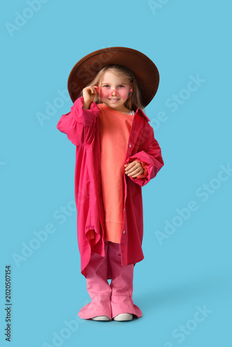 Cute little girl in adult c...