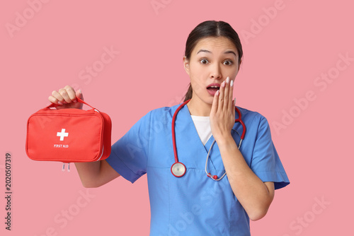 Shocked Asian female doctor...