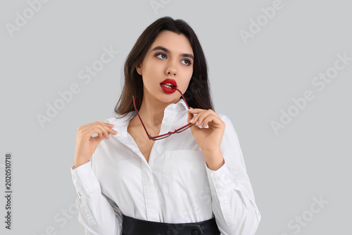 Attractive secretary with e...